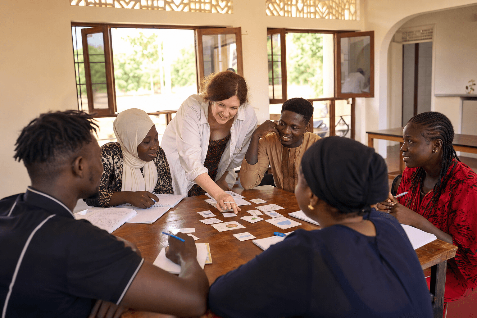 Concept image of adult participants collaborating during a language workshop